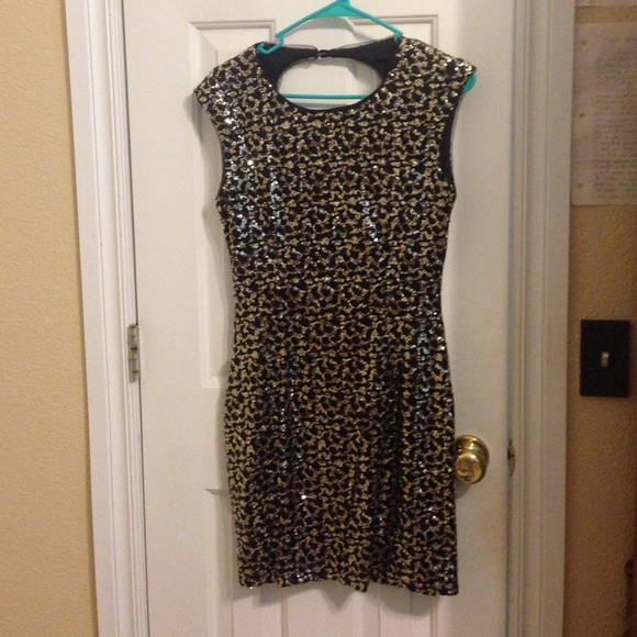 Gold and black sequin party dress.