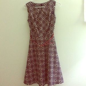 Tan navy dress with red belt