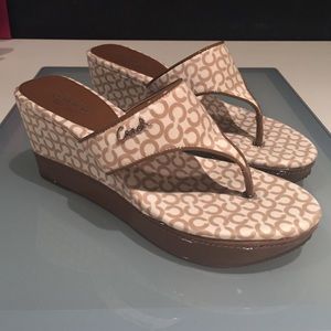 LIKE NEW Tan coach wedged flip flops
