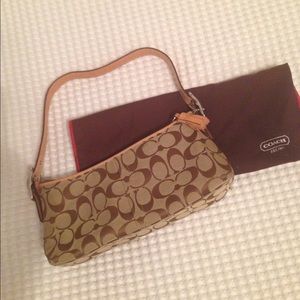 Coach handbag like new, hardly used.