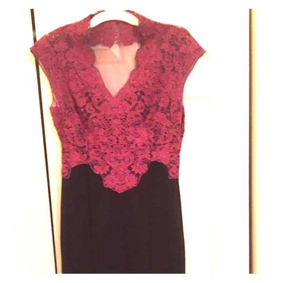 A fitted lace dress. Mauve and black.