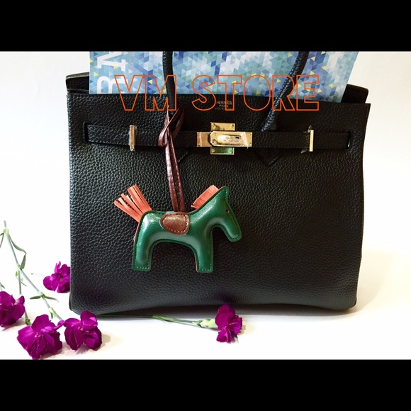 Green rodeo bag charm with yellow list, No box