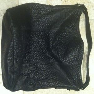 Black leather purse by Tylie Malibu