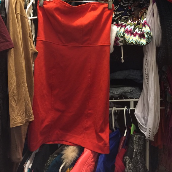 An orange tube top dress