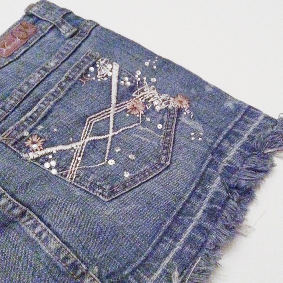 Distressed Jean mini skirt with embellishments - Picture 1 of 4