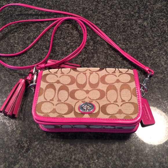 Authentic Coach signature cross body purse