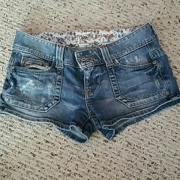Distressed guess shorts