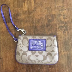 A Coach wallet/wristlet