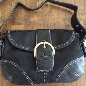 A small Coach purse