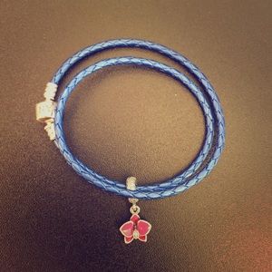 Pandora blue leather bracelet with orchid charm
