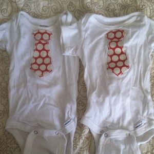 2 newborn tie onesies