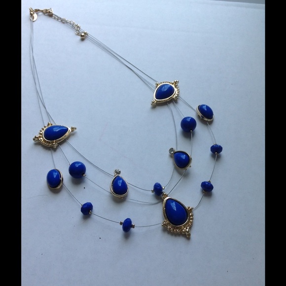 Blue and gold statement necklace and earrings
