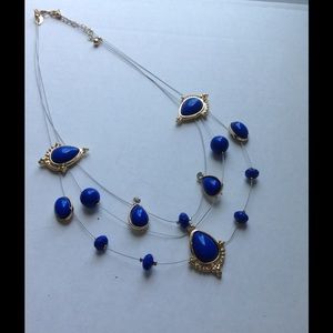 Blue and gold statement necklace and earrings