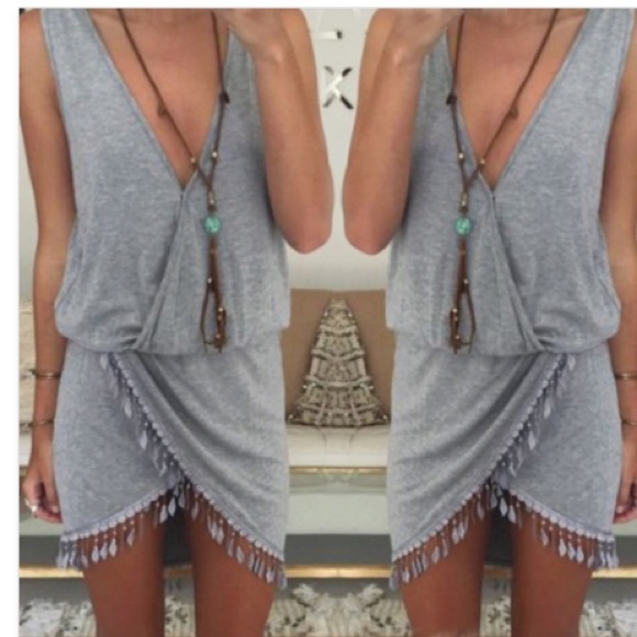 Tshirt dress. Feather fringe detail.