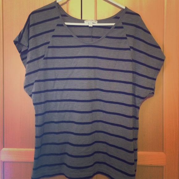 Black and grey over sized short sleeved shirt.