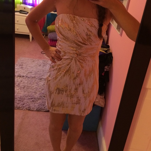 White and gold sequin dress