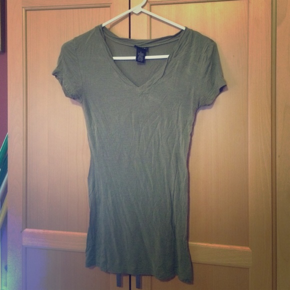 Dark green short sleeve shirt.