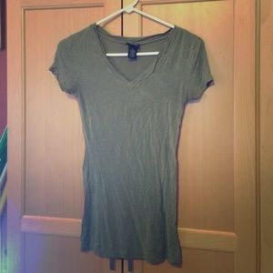 Dark green short sleeve shirt.