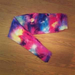 Silky material leggings with a cosmic print.