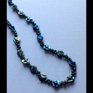 Oil spill statement necklace