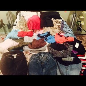 Lot of maternity clothes.  S-L.  25+ items.