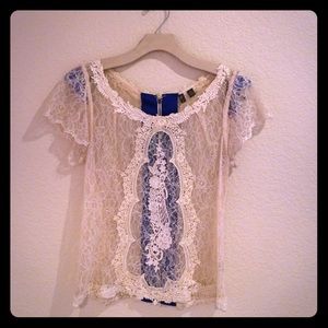 Lace top with royal blue exposed zipper back