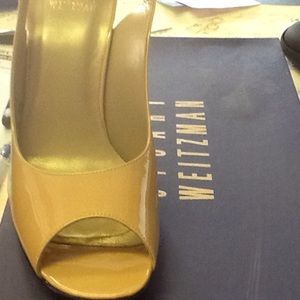 Beige Stuart Weitzman 2 inch heels.