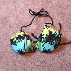 Triangle shaped bikini. Tropical print