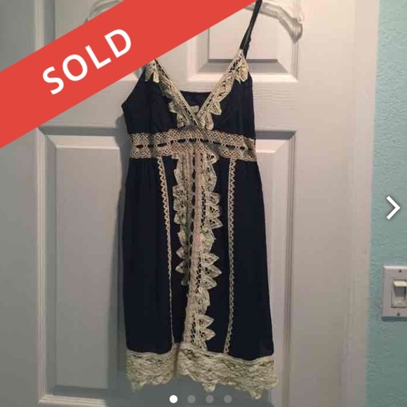 Dark blue and cream dress