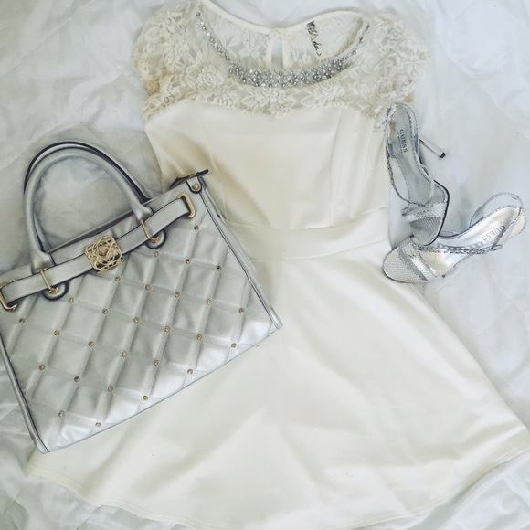 Dress with beaded neckline
