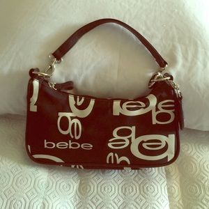 Small black and white Bebe purse