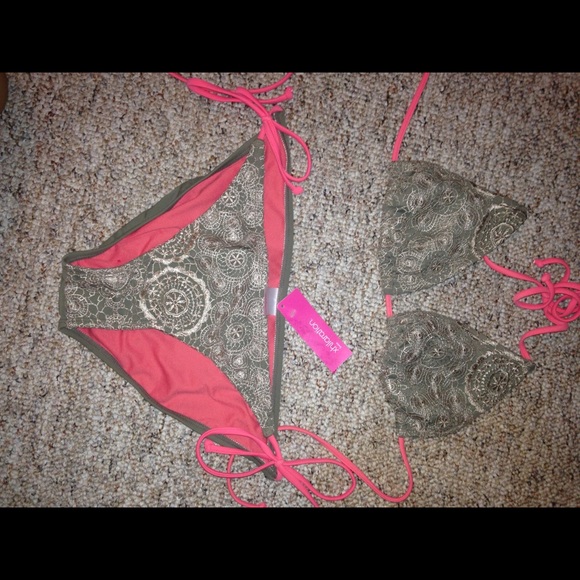 Tan lace and coral bikini