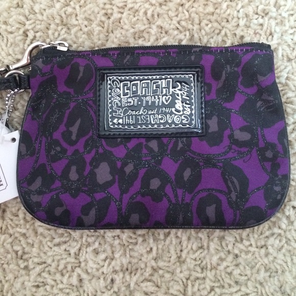 Purple and black coach clutch