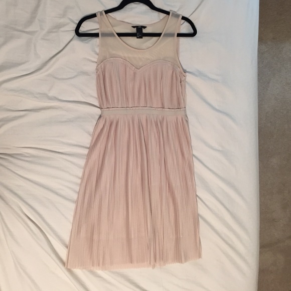 Blush/pale pink dress.