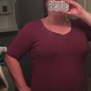 Nice stretchy top. Dark grape/maroonish color