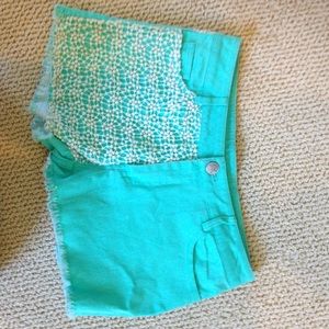 Adorable sea foam green shorts with eyelet detail