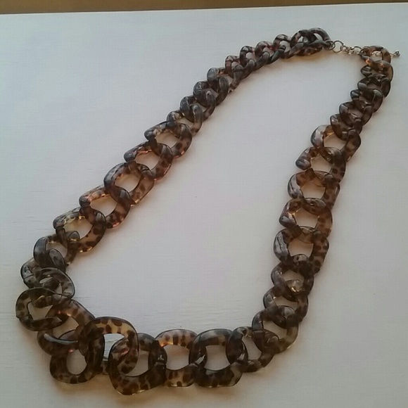 Tortoise colored long necklace. Very cool piece.