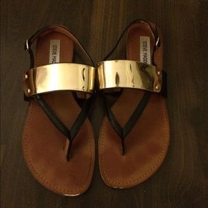 Black and gold Steve Madden sandals