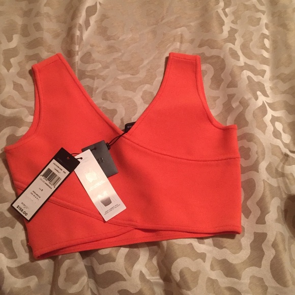 BCBGMaxAzria Tops - Reversible crop top in coral color.