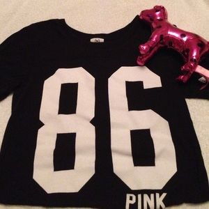 Black Vs shirt including Pink polkadot VS dog