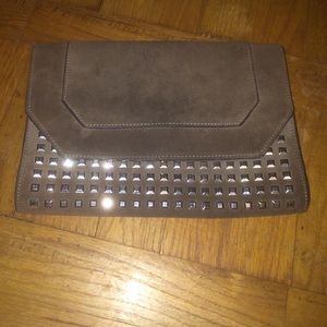 Suede studded clutch