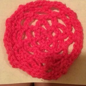 A pink flower of yarn