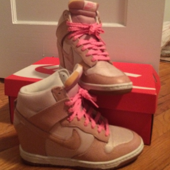 Pink Nike Sky High wedge sneakers.