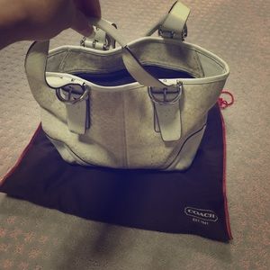 Authentic Coach White leather with logo purse.