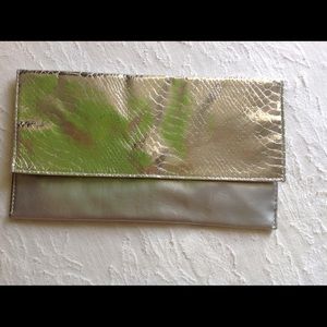 SACKS FIFTH AVENUE Silver clutch