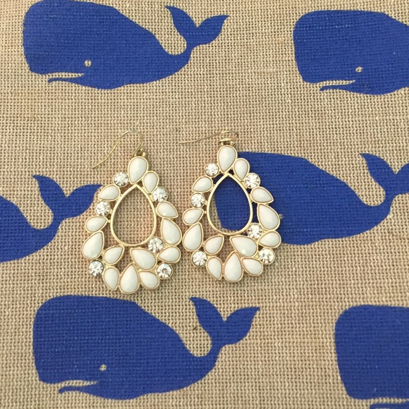 White and gold statement earrings