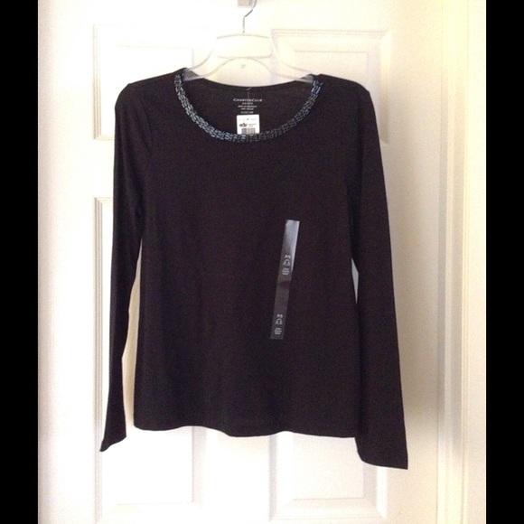 An elegant black blouse for casual evening wear.