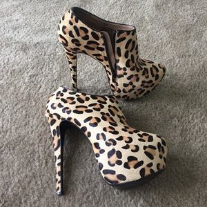 Pony skin, extremely high booties. Gently worn