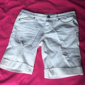 White, distressed shorts