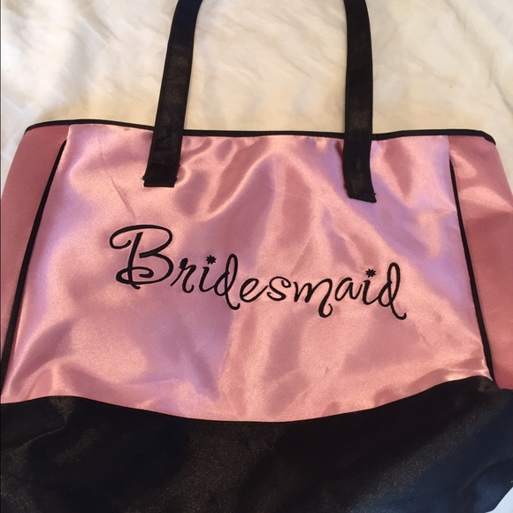 A pink silk feel bridesmaids bag